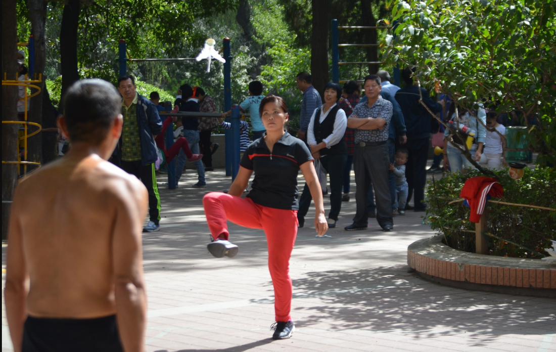 People playing Jianzi